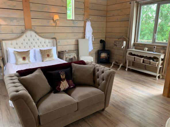 Vine Lodge, Deer Park Retreats, The Cotswolds, Sleeps 2 Bedroom Vine Lodge Sofa and Fire